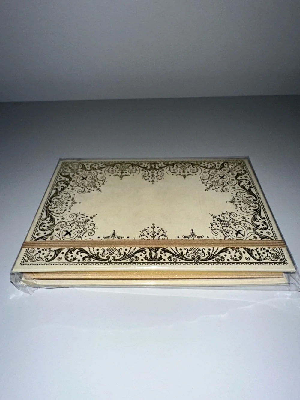 Gilded Ivory gold-foiled embossed cover gilded pages elastic closure journal